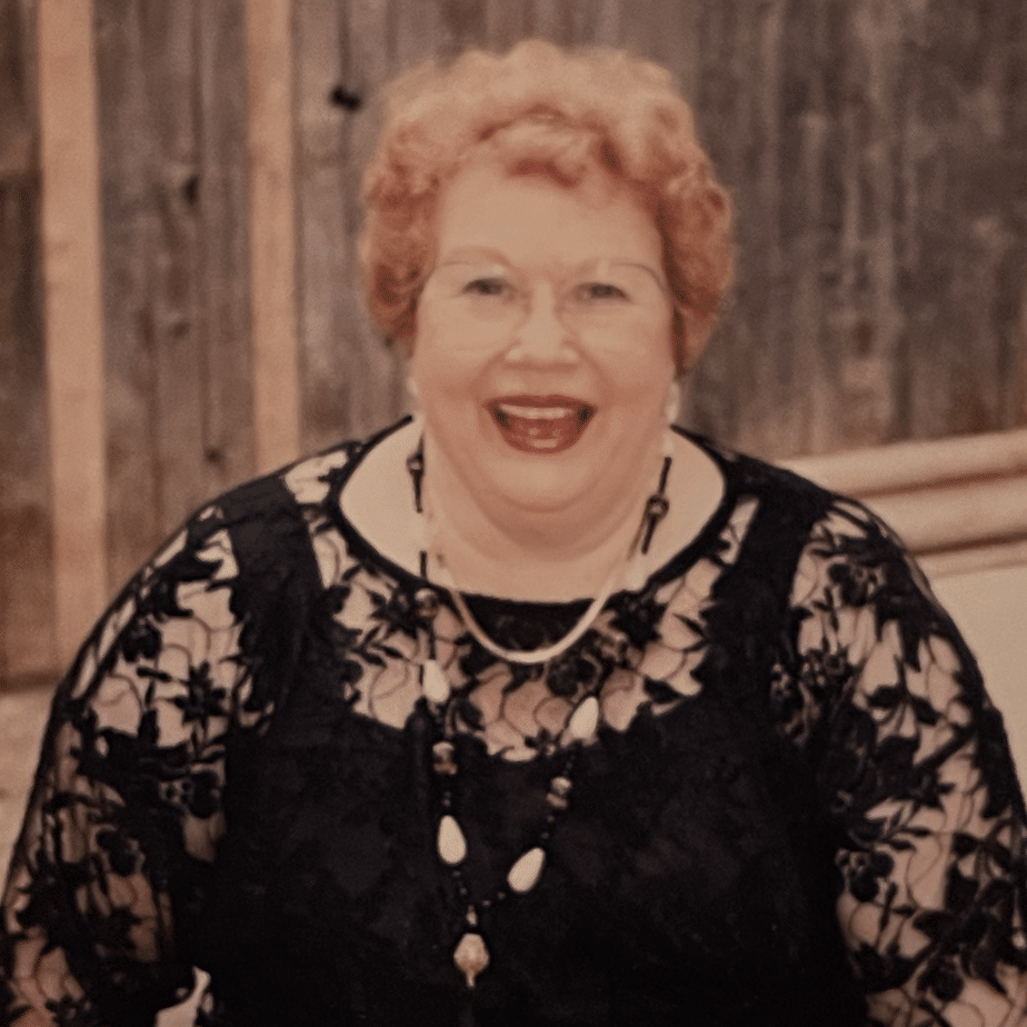 Jo Curtis Jo Curtis smiling in a black blouse